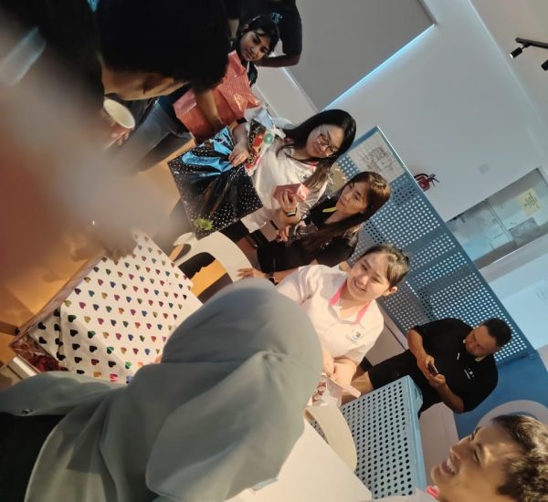 team checking our their christmas gifts